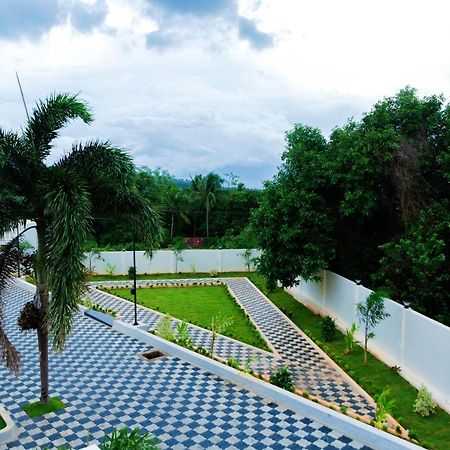 Westn Resorts Kuttalam  Bagian luar foto